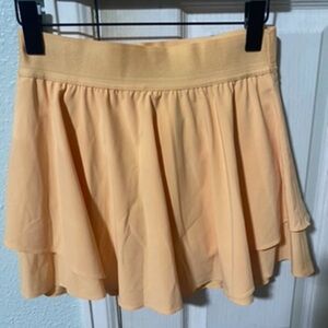 Lululemon Athletica Soft Peach Court Rival Hi Rise Skirt